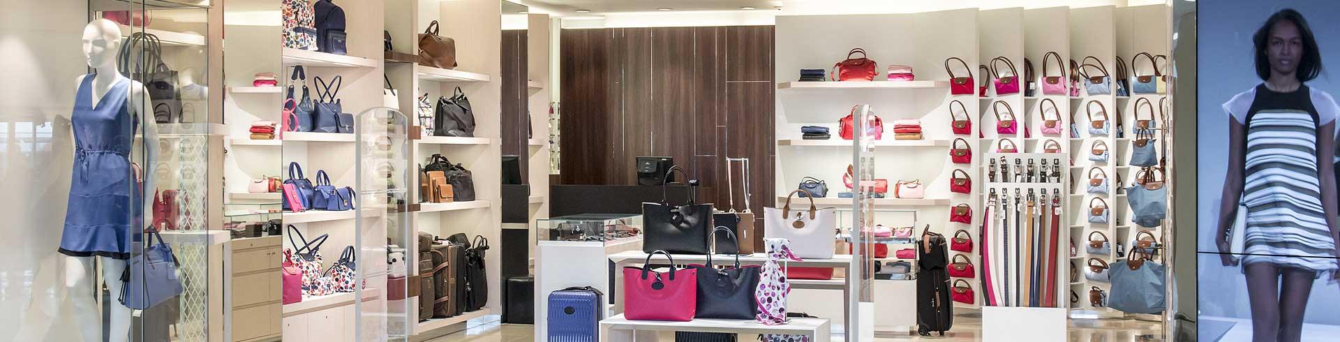 Longchamp Shop at Duty Free Cosmetics Boutiques at the International Airport  at Charles De Gaulle, Paris. Luxury French Brand Editorial Stock Photo -  Image of indoors, airport: 221824703